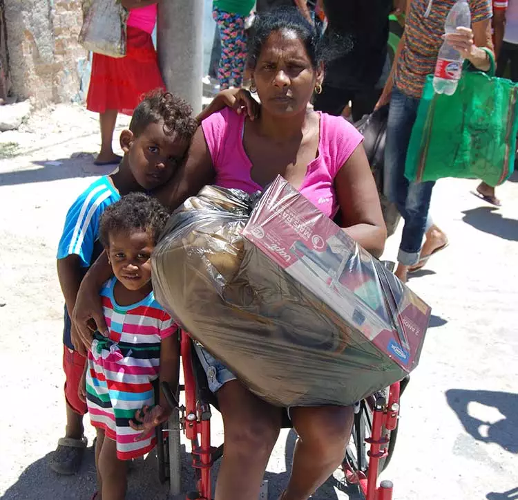 ayuda humanitaria caritas cuba la habana familia madre discapacidad ninos