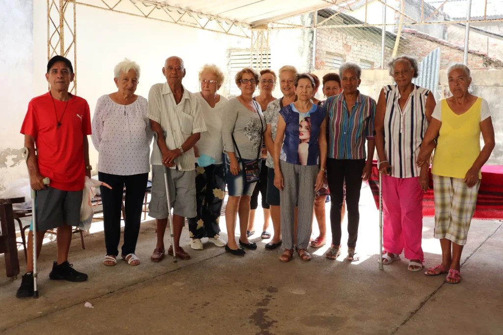 Misa y musica unen a los programas de Caritas en Abreus 2